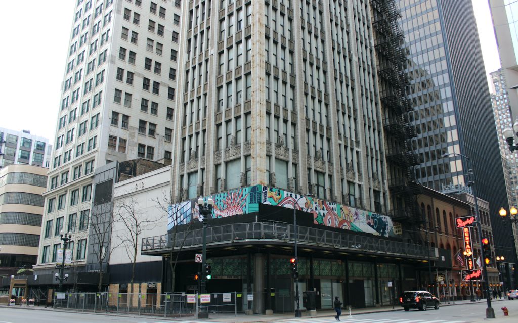Photograph of the condemned 208-12 South State Street buildings (center) between Consumers Building and Century Buildings in Chicago