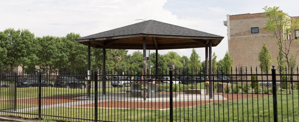 Photograph of empty gazebo in park.