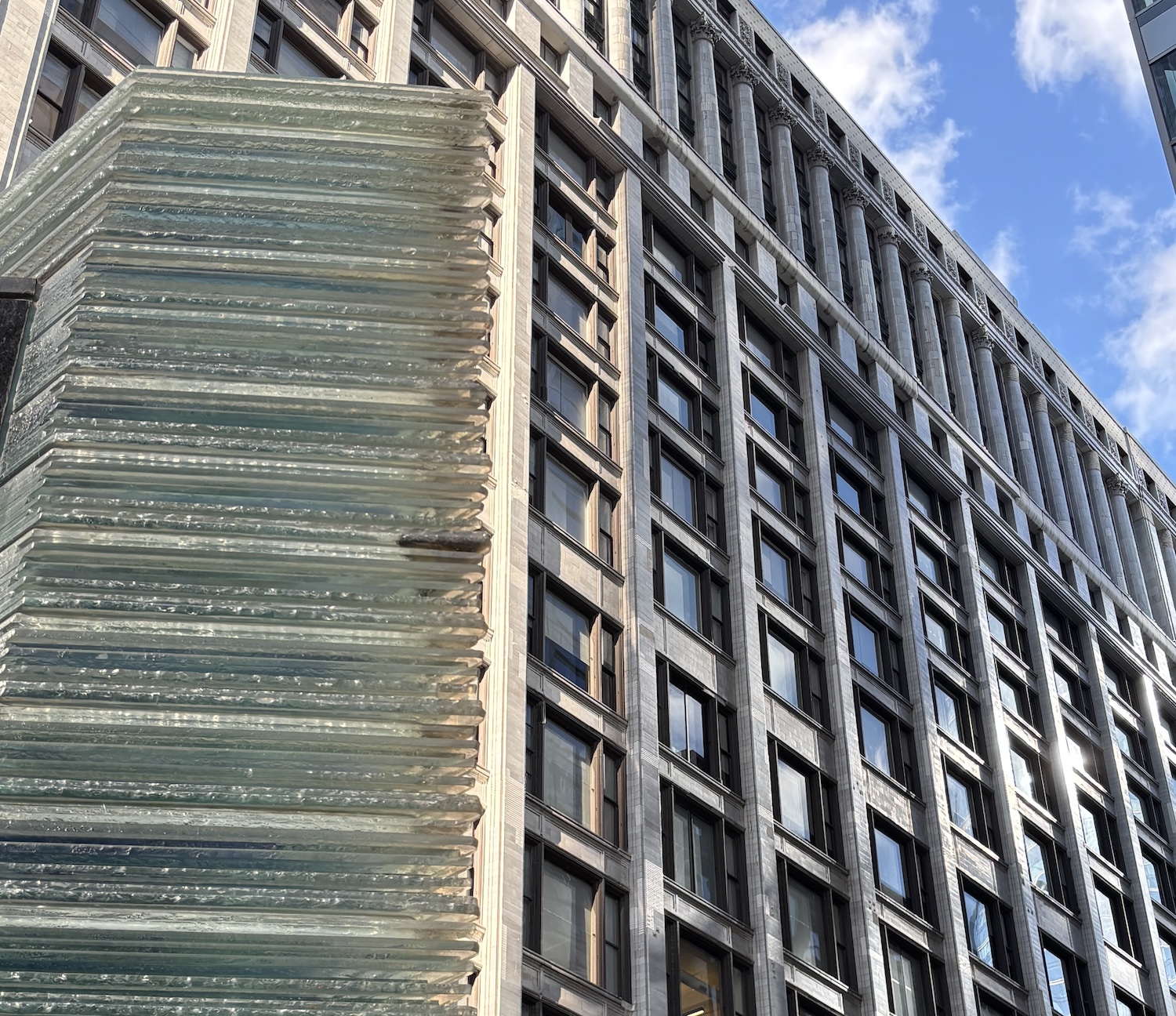 Photo of building with glass block that lines up with edge